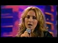 tim freedman, of the whitlams, performing 'keep the light on' with lisa mccune on the good friday appeal telethon in 2006.