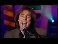 tim freedman, of the whitlams, performing 'keep the light on' with lisa mccune on the good friday appeal telethon in 2006.