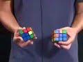 Two Hands - Two Rubiks Cubes