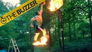 Watch dunk extraordinaire WIllie Rhodes dunk over a flaming barrel into a flaming hoop by @The Buzzer