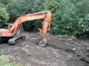 Loading Muck into a Dump Truck