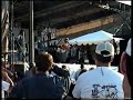 mary chapin carpenter performing with her band in newport, ri in august 1993.  (her band is john jennings, jon carroll, j. t. brown and robbie macgruder - who isn't visible because he/his drumkit is at stage right).  not the greatest sound quality, because the camera is near the stage-right speakers.