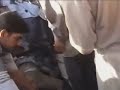 Body inspections in Fallujah, Iraq.