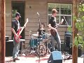 Prisom, featuring Davis Carlin on lead guitar, Jordan Cope on bass, and Nathan Anderson on drums, played a set at the Memorial Day (2007) Rock and Roll Bash in 