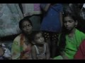 Sitting with a slum family, Mumbai