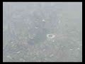 flying-over-shanghai-city-stadium-bund-and-oriental-pearl.html