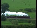 6233 duchess of sutherland put in some cracking performances hauling the cathedrals expresses on the 20th and 28th of august.
first shot is of the duchess near cole on the climb out of castle cary on the returning run from exeter, in which the engine could be heard before castle cary.

second shot is from the 27th, and was taken at frampton mansell on the climb to sapperton on the return leg from from worcester. the engine broke the record for the fastest accent of the bank, topping the summit at 38mph with an 11 coach load. great sound!!