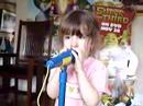 Lauren singing on her mic