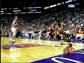 Kevin Johnson (KJ) slams over Hakeem \"The Dream\" Olajuwon