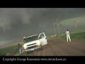 Part One of storm chase clips from 2008 including a close call with a tornadic circulation in Kansas on May 22nd. A tornado was forming biside us and we had to flee the area as items were being sucked out of our vehicle by the winds.www.stormchaser.ca