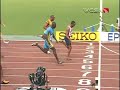 Gay chases down Powell for 100-meter gold