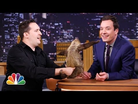 Jeff Musial Feeds Buffalo Wings to a Lizard