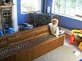 3 year old boy Moving a paper couch