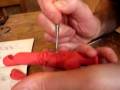 Modelling a puppet head in plasticene