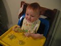 Dereks first birthday loving the cake Dereks first birthday loving the cake