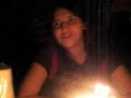 Angie blows out the candles.