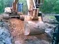 Cat 330 excavator stuck in lake