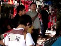 Músicos tocando en el santuario del Gauchito ubicado a las afueras de Mercedes (Corrientes)