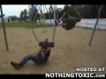 little kid gets owned by a swing