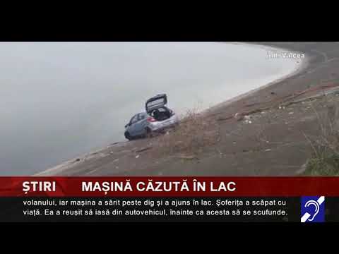 Mașină căzută în lac