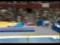 Gymnast jumps off of springboard...