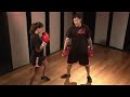 Using Kickboxing Pads : Holding Kickboxing Pads for Knee strikes Using Kickboxing Pads : Holding Kickboxing Pads for Knee strikes