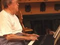 jim robinson (88) and ruthellen robinson(85) play bill bailey on tenor banjo and piano, at home in kansas city in 2001