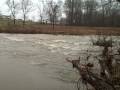 at 2:45 p.m. tuesday, ben williams road was still open to traffic despite torrential currents running across it.