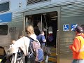 Eli boarding the Metra train