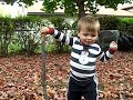 Alex playing in leaves