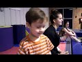 Alex jumps in ball pit