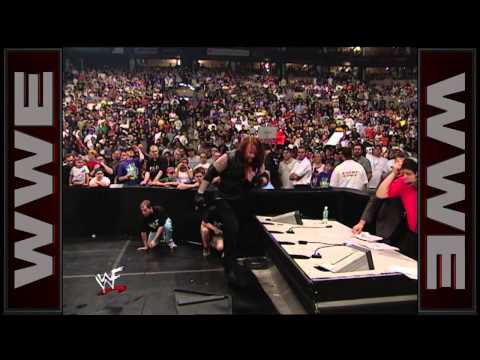 MCMAHON - The Rock, The Undertaker & Kane team together but only one man has the chance to walk out with the WWE Championship.