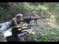 Hot chick shooting the Barrett .50 Cal