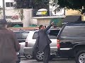 Governor Schwarzenegger leaves Starbucks with his Bodyguards
