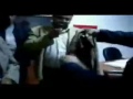 يوتيوب جديد القذافي يقول لاحد الثوار انا مثل ابوك ضربه كف
