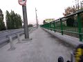 Triking over the old bridge on Sava river