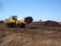 624H loading manure spreader