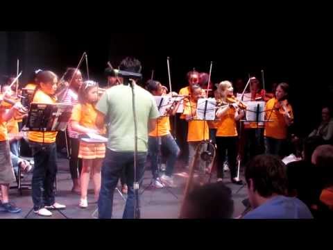 music partners - Filmed at the stunning Langston Hughes Performing Arts--Concert, Education Director, Mr. Daniel Lee, conducts