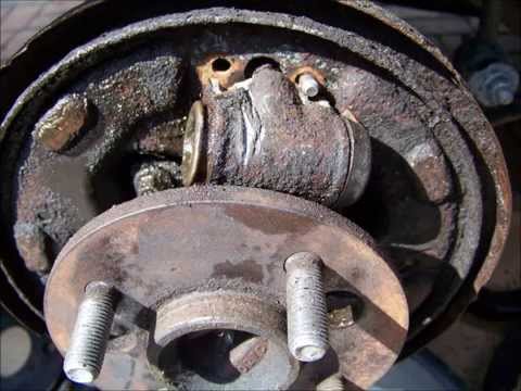 Saturn SL2 rear drum brake wheel cylinder replace fix remove 1995