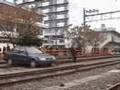 Car stuck on train track