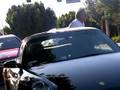 Dustin Hoffman getting in his Porsche Carrera - idGoBack.com