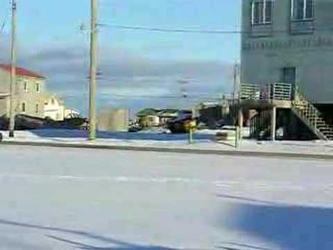 Inupiaq Eskimo Driving Through ...