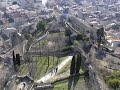 The Dungeon of Crest (Drôme) is the highest tower in all of France, at an impressive 170 feet high.  Plus haut donjon de France, haute de 52 mètres, la Tour de Crest est la gardienne d'une des rares portes des Préalpes drômoises. Sa construction commence au XIIè siècle. Elle est à l'origine la composante majeure d'une vaste forteresse qui domine la ville de Crest. Tout au long du Moyen Age, la Tour est au cœur des luttes entre deux seigneurs qui se disputent sa possession. A partir de 1419, elle devient propriété des Rois de France qui la concèdent à différentes familles dont les Grimaldi, princes de Monaco. Soucieux de l'importance de la forteresse, Louis XIII en ordonne le démantèlement en 1633, et seule la Tour échappe à la destruction. La Tour de Crest sert alors de prison jusqu'au XIXe siècle et devient propriété nationale après la Révolution. Ce n'est qu'en 1988, cent ans après son classement au titre des Monuments Historiques, que la Ville de Crest achète la Tour. Les donjons sont les pièces maîtresses de la fortification des châteaux médiévaux. Dissuasifs, ils sont la base des opérations offensives, le lieu de refuge en cas d'attaque et le symbole de la puissance seigneuriale. La Tour de Crest demeure une parfaite illustration de ce système architectural de défense, avec ses dimensions impressionnantes : 32 mètres de long sur 20 mètres de large et une hauteur qui culmine à 52 mètres. Elle nous révèle encore aujourd'hui toutes les techniques stratégiques utilisées contre l'ennemi. Herses, bretèches, meurtrières jalonnent un parcours où le Moyen-Age a laissé son empreinte. Mais la Tour fut aussi un lieu d'habitation pour les seigneurs. Ses 15 salles sont ainsi autant d'espaces de découverte de la vie et de la société au Moyen-Age. La Tour de Crest est d'ailleurs toujours considérée comme l'un des plus beaux édifices de l'architecture médiévale. Au XVIIe siècle, lorsqu'elle devient définitivement une prison, la Tour a déjà une longue histoire derrière elle. Réputée pour sa puissance, elle s'impose dès lors tristement comme un lieu de répression. Lieu de mémoire de la persécution des protestants dans la Drôme, elle a accueilli des détenus politiques ou des fils de bonnes familles enfermés par lettre de cachet, mais aussi des prisonniers de droit commun. Gardienne de l'ordre établi par l'arbitraire royal, la Tour est plusieurs fois dénommée 