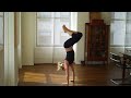 Kathryn Budig in Bakasana (Crow) to Handstand