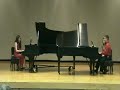 jonathan & jennifer mason perform variations on a theme by paganini by witold lutoslawski in a piano duo recital at university of central florida's rehearsal hall on december 8, 2007.