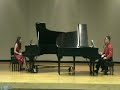 jonathan & jennifer mason perform variations on a theme by paganini by witold lutoslawski in a piano duo recital at university of central florida's rehearsal hall on december 8, 2007.