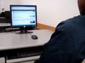 Vernon typing an entrie at MDC
