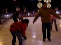 A child attempts to ice skate at Pentagon Row