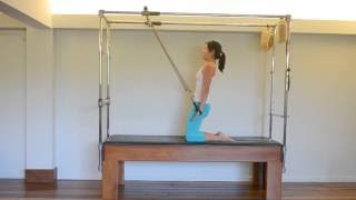 Variação do Thigh Stretch no Cadillac