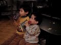 Peston and Stanley sit together to drink milk